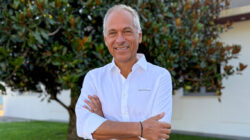 Italian businessman in white shirt smiling