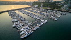 bird's eye view of Torquay marina full of boats at sunrise