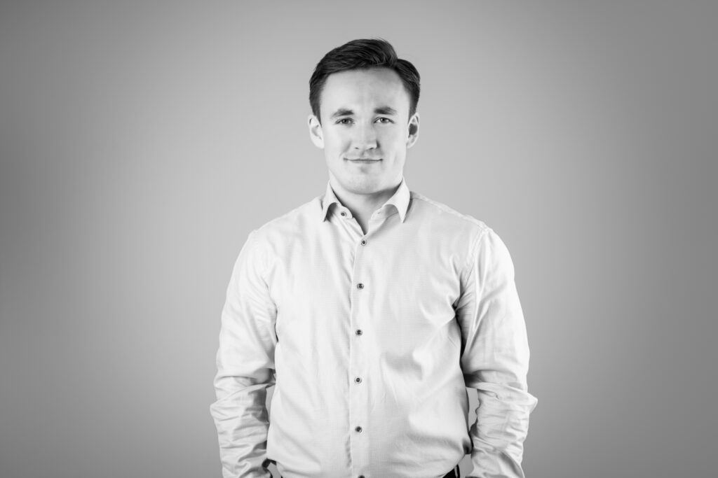 black and white photo of business man in shirt