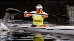 Image of woman rower with new Zhik clothing