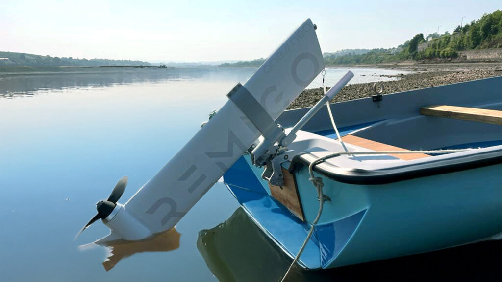 Remigoone engine on back of a boat