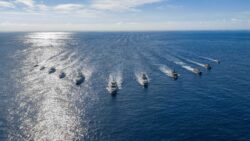 aerial shot of ferretti flotilla of boats