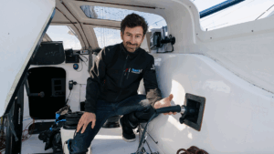 male skipper inside boat