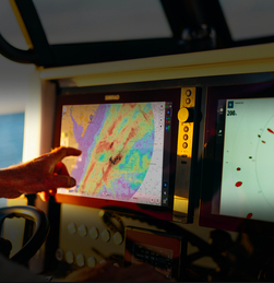 Simrad FishCast hand points at screen detail