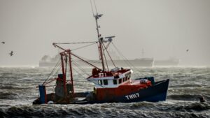 A trawler in rough seas off Teignmouth