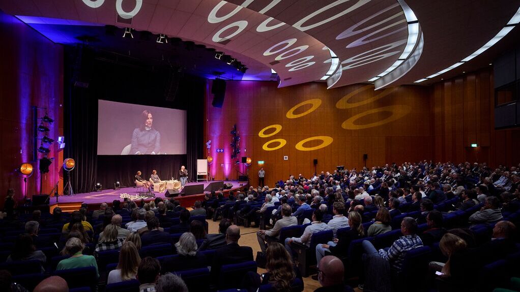 Event auditorium with conference going on