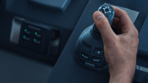 image of boat joystick with hand operating