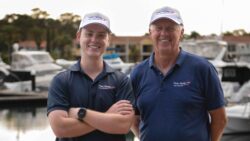 two man in caps at marina