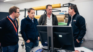 Jake Cronk (COO), Jonathan Wilson (CEO), Charles Fawcett (founder), Jamie Smith (MD)