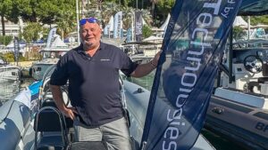 Martin Schwarz EPTechnologies stands on a boat