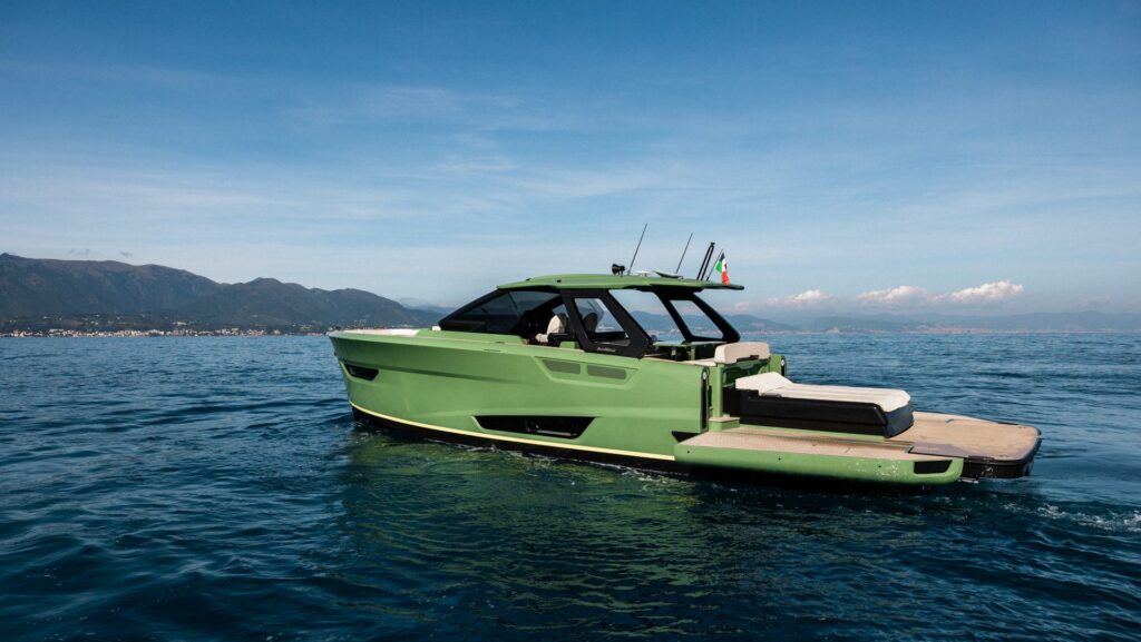 Side view of green Bellini Astor yacht