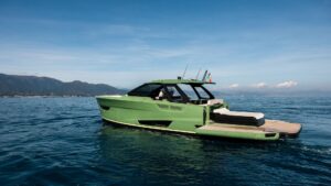Side view of green Bellini Astor yacht
