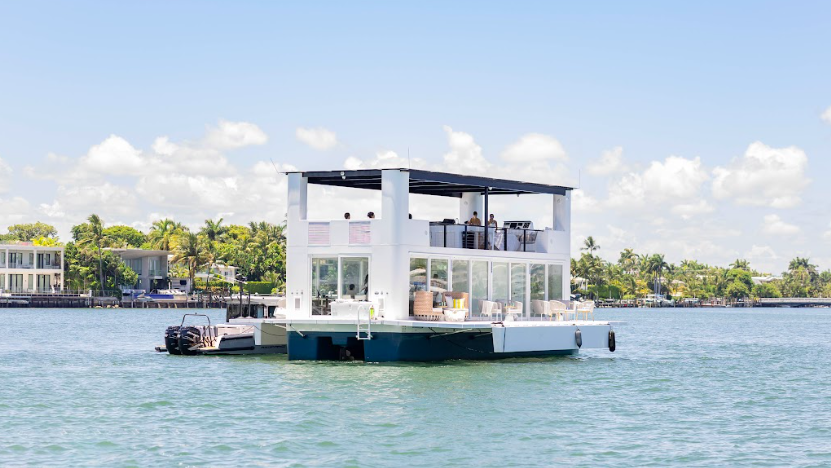 solar-electric yacht from Arkup looks like a house on the water