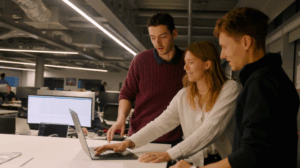 A trio of experts look at data while using MarineShift360 impact assessor