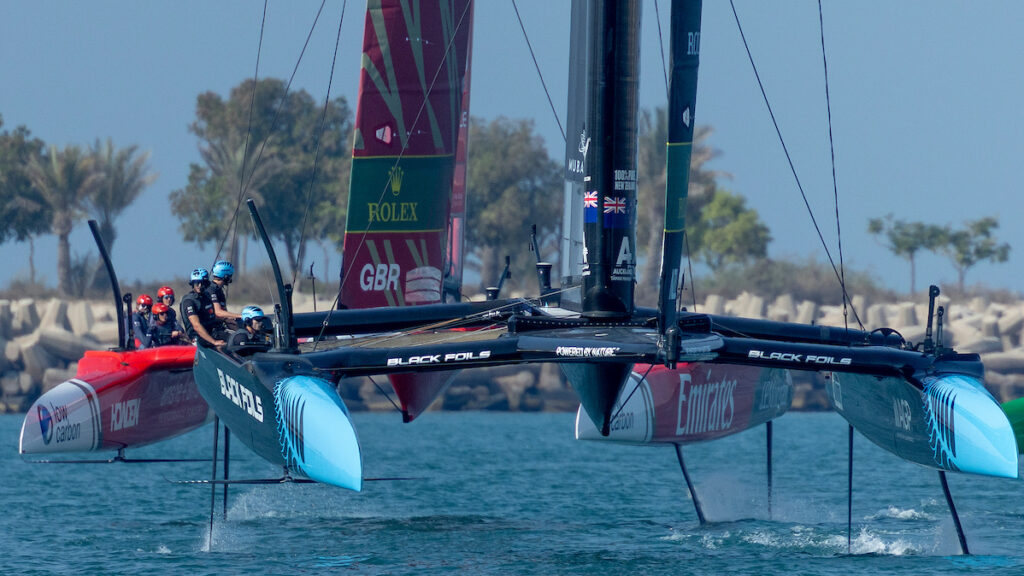 Black Foils SailGP Team helmed by Peter Burling and Emirates Great Britain SailGP Team helmed by Dylan Fletcher on Race Day 2 of the Mubadala Abu Dhabi Sail Grand Prix 2025 Season Grand Final presented by Abu Dhabi Sports Council held in Abu Dhabi, United Arab Emirates, Sunday 30 November 2025. Rolex SailGP Championship Event 12 2025 Season. Photo: Felix Diemer for SailGP. Handout image supplied by SailGP