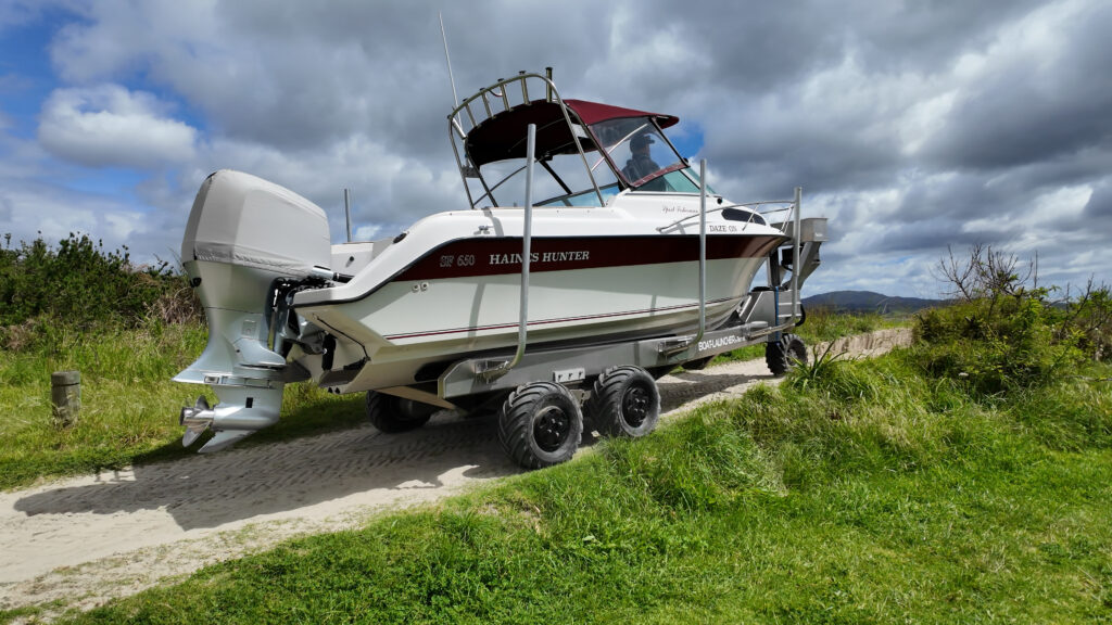 Tectrax remote boat launcher system in action on road