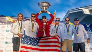 US Riptide Racing sailing team lifting cup