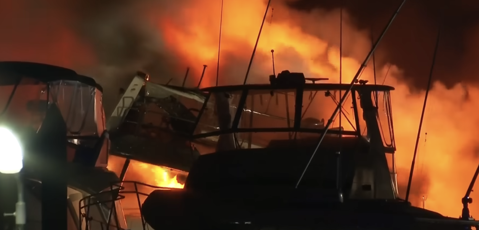 Three luxury yachts sink after Sydney marina fire