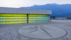 Cranchi is nestled at foot of Italian Alps - plant with mountains behind