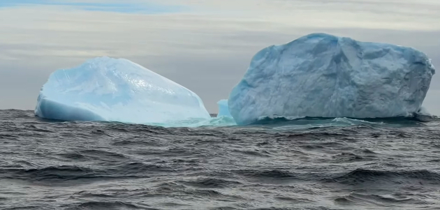 icebergs in sea as Jari Saario rescued from solo row