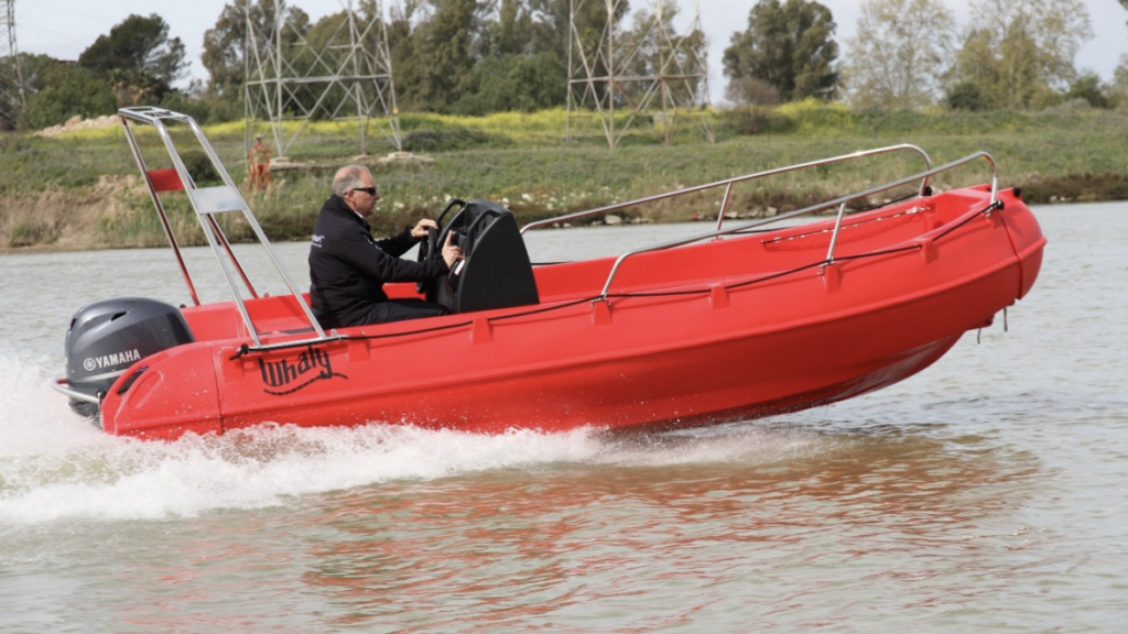 Orange whaly boat rib with yamaha engine