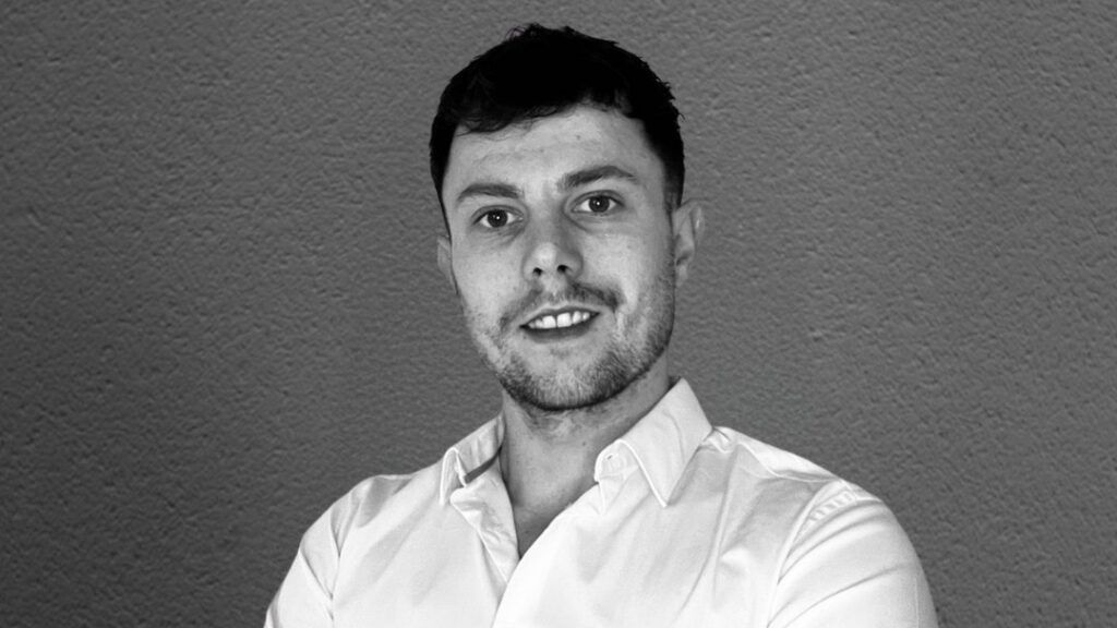 Business profile shot of a man in white shirt