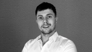 Business profile shot of a man in white shirt