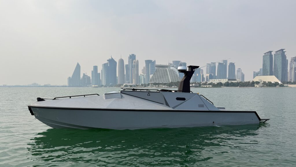 Castoldi USV on water with city skyline in backgound