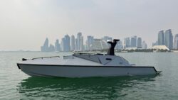 Castoldi USV on water with city skyline in backgound