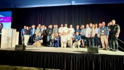 Group of people on stage at industry marine awards