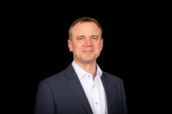 Head photo of man in suit and white shirt
