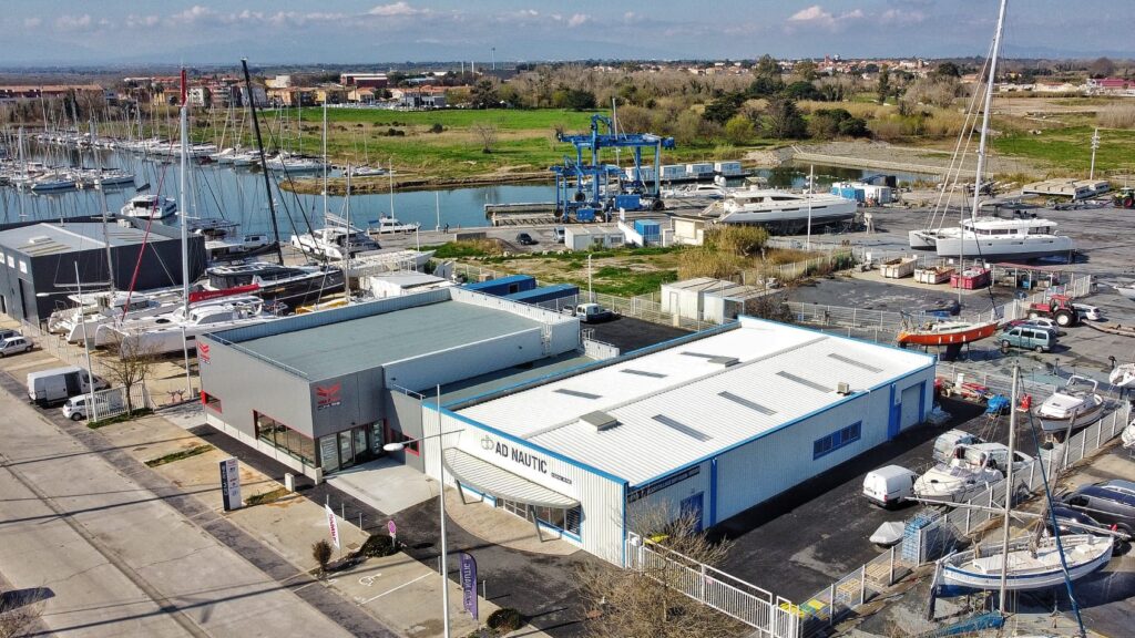 Aerial view of factory plant by a river