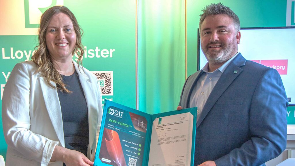 Maggie Kennedy, Director of Partnerships at GIT Coatings, receiving Type Approval certificate from Chris  Pfisterer, VP Commercial - Americas at Lloyd's Register.