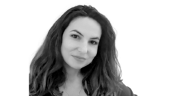 black and white head shot of a woman