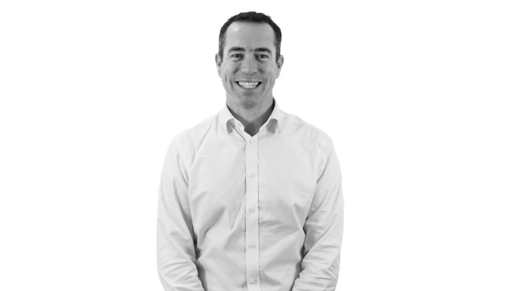 black and white image of Nick Hatfield, MD, Sanlorenzo Yachts UK