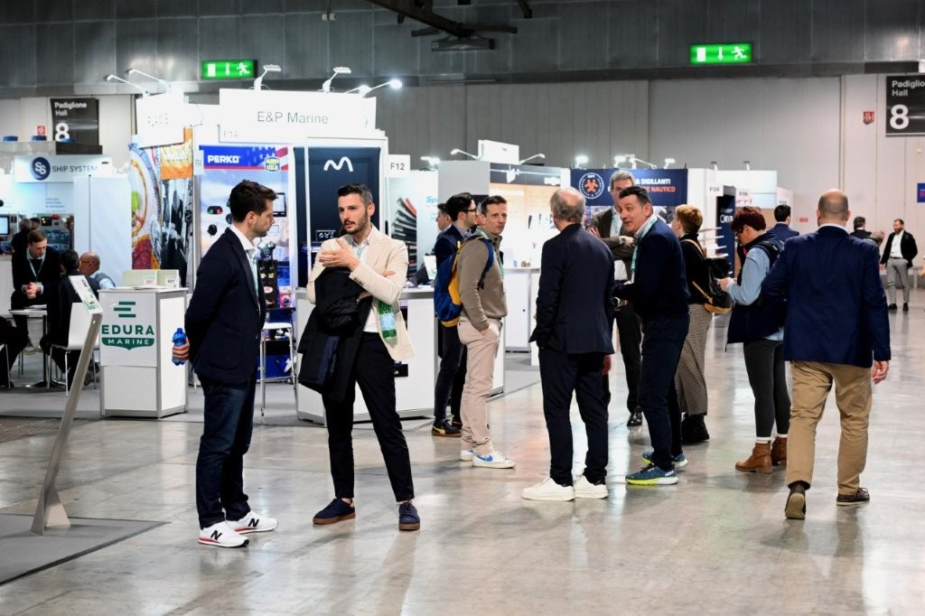 business people milling around an trade expo