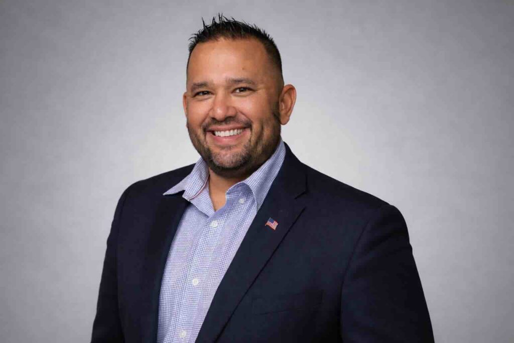 man in suit smiling in corporate style profile shot