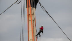 Connie Sheeran, rigger, up foremast of HMS Victory. Image courtesy of Matt Sills