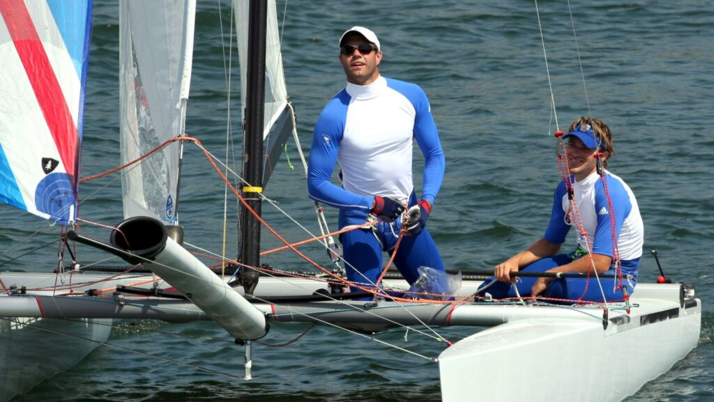 Two people sailing on boat