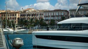 Marinedi Marina di Cagliari shows boat in front of lovely buildings