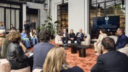 Group of people at a forum talking