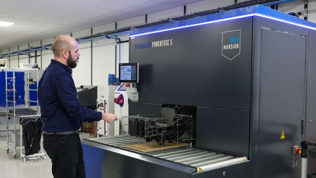 Workshop coordinator James Wheeler removing parts from the vapour fuse
