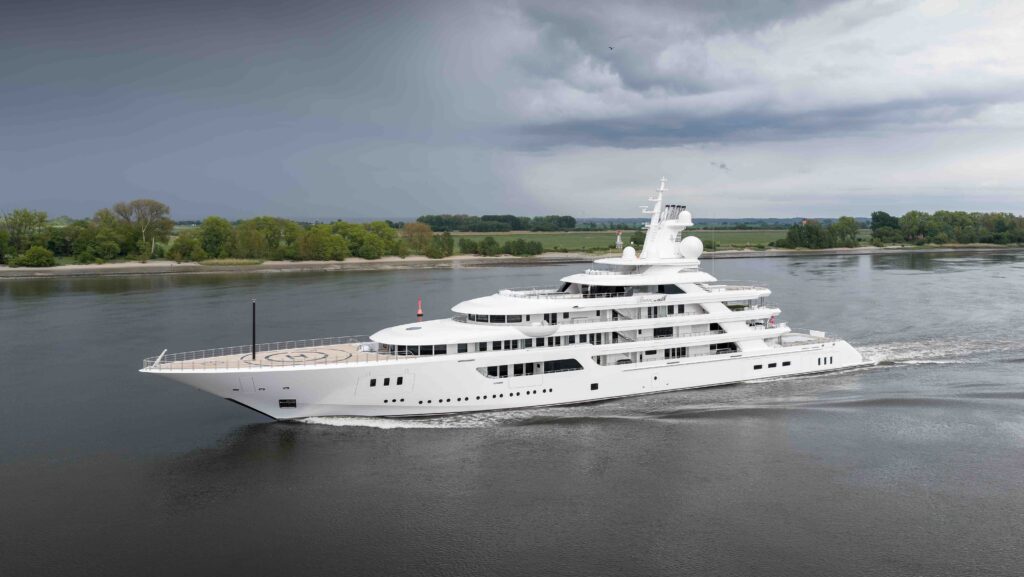white large superyacht on the water