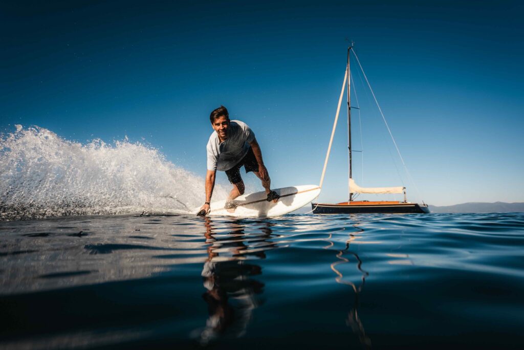 Men on LIND Electric surfboard