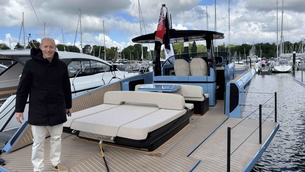 Oliver Lanza, Sebino Yachts at British Motor Yacht Show on stern of Bellini