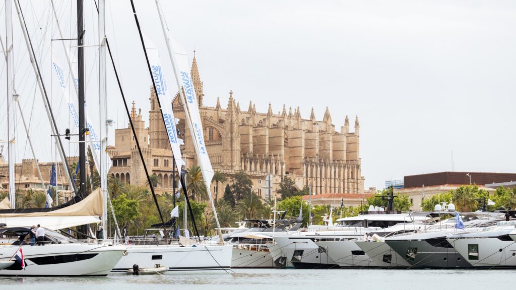 Palma cathedral with boats in front