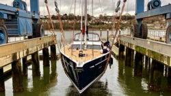Oyster 495 being lifted in boat cradle at Saxon Wharf