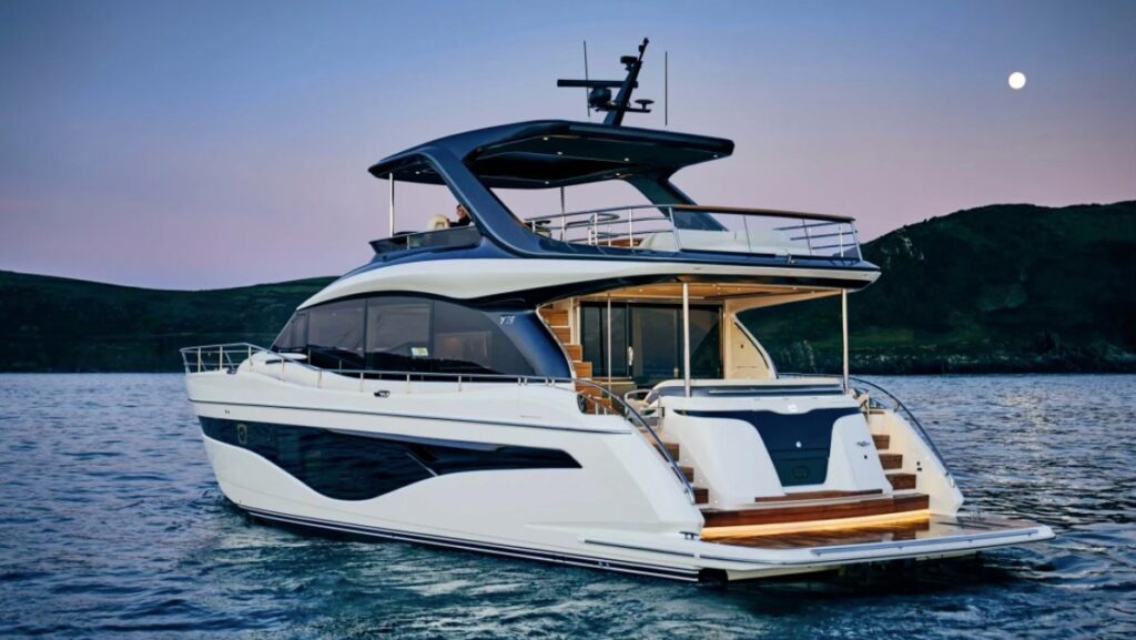 white modern flybridge large motor boat
