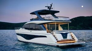 white modern flybridge large motor boat