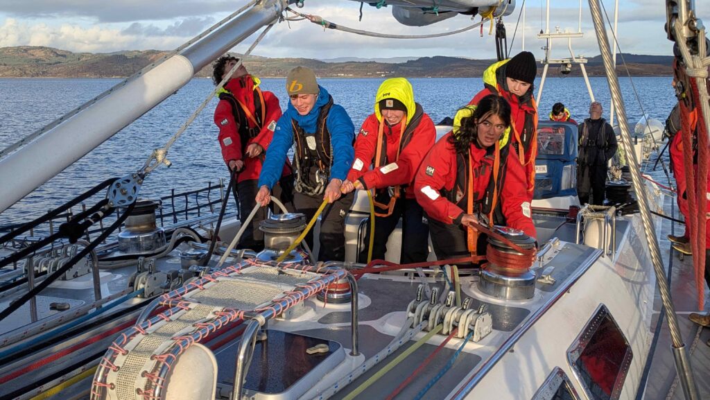 young sailors onboard a sailing boat